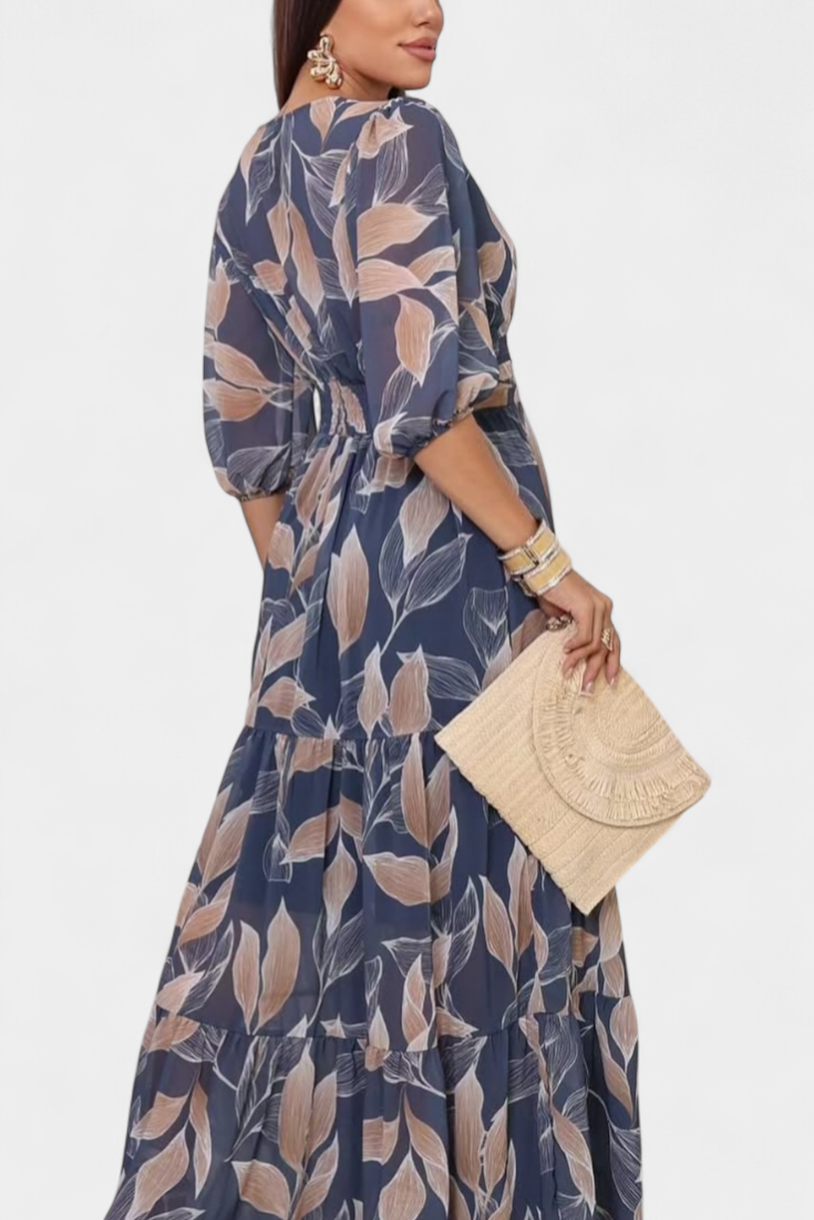 Aísha Vestido Largo Floral con Corte Fluido y Motivo de Hojas